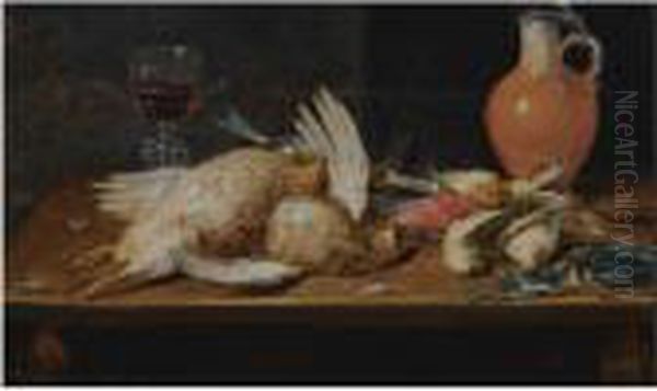 A Still Life With A Robin, A 
Kingfisher, Partridges And Songbirds,all On A Wooden Table, Together 
With A Glass And An Earthenwarejug Oil Painting by Alexander Adriaenssen