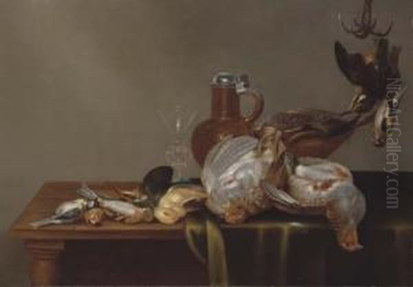 A Blue Tit, A Red Finch, A 
Patridge, A Kingfisher, And Other Dead Birds On A Half Draped Table, 
With A Glass And Silver Rimmed Jug Oil Painting by Alexander Adriaenssen