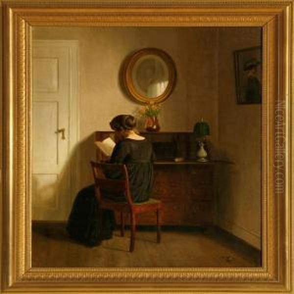 Interior With A Woman Sitting At The Bureau Oil Painting by Alfred K. Harald Broge