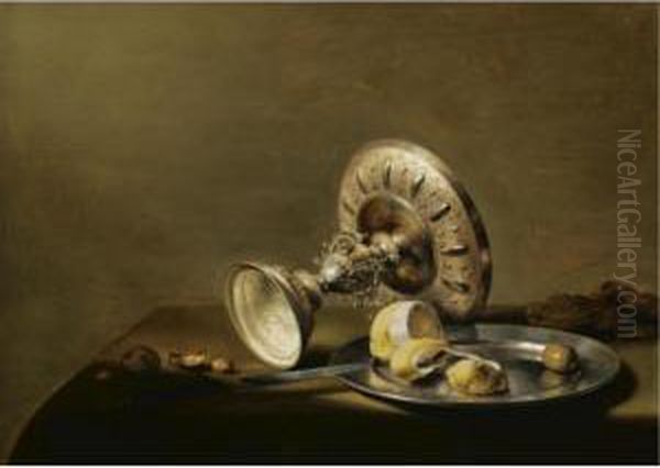 A Still Life With An Overturned 
Silver Tazza, A Silver Plate With A Partly Peeled Lemon And An Olive, 
With Walnuts And Hazelnuts On A Table Draped With A Green Cloth Oil Painting by Pieter Claesz.