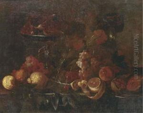 Grapes, Lemons, Pomegranates, An
 Orange And Other Fruit On Pewter Platters, With A Tazza Of Figs On A 
Table Oil Painting by Cornelis De Heem