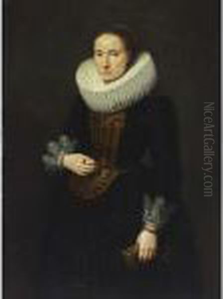 A Portrait Of A Lady, Standing 
Three-quarter Length, Wearing A Black Dress With White Lace Cuffs And 
Collar And An Embroidered Bodice, Holding Gloves In Her Left Hand Oil Painting by Cornelis De Vos