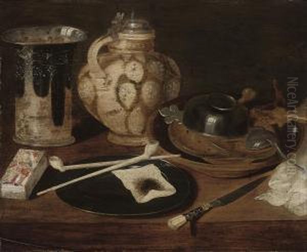 Pipes And Tobacco On A Pewter 
Plate, A Silver Mounted Rhinish Pitcher, A Deck Of Cards, And An Ecuelle
 And Various Other Vessels On A Wooden Table Oil Painting by Georg Flegel