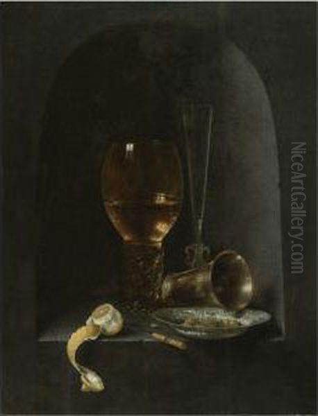 Still Life With A Roemer, A 
Fluted Wine-glass, A Silver Goblet, Ablue-and-white Porcelain Bowl 
Filled With Green Olives, A Partlypeeled Lemon And A Knife, All Arranged
 Within A Stone Niche Oil Painting by Willem Claesz. Heda