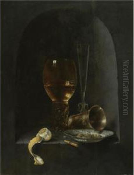 Still Life With A Roemer, A 
Fluted Wine-glass, A Silver Goblet, A Blue-and-white Porcelain Bowl 
Filled With Green Olives, A Partly Peeled Lemon And A Knife, All 
Arranged Within A Stone Niche Oil Painting by Willem Claesz. Heda