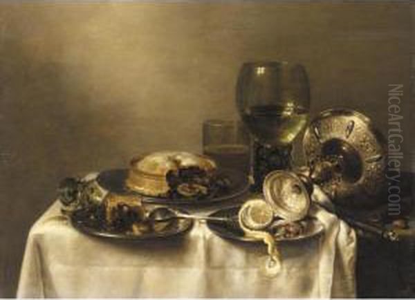 A Still Life Of An Overturned 
Silver Tazza, A Roemer With White Wine, A Glass Beaker With Beer, And 
Three Pewter Plates With A Partly Peeled Lemon And Partly Eaten Pies, 
All On A Table Partly Draped With A White Cloth Over A Green Cloth Oil Painting by Willem Claesz. Heda