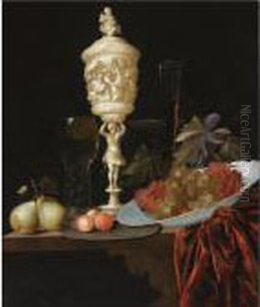 A Still Life With An Ivory 
Carved Cup And Cover, A Roemer, Pears, Prunes On A Pewter Plate, Grapes 
In A Porcelain Wan-li Bowl, A Flute-glass And A Tazza, All On A Wooden 
Ledge Draped With A Red Velvet Cloth Oil Painting by Johann Georg (also Hintz, Hainz, Heintz) Hinz