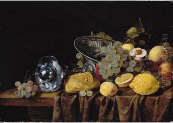 A Still Life Of Lemons, Grapes 
And Peaches, With A Bread Roll And A Silver Pokal On A Partly Draped 
Table Oil Painting by Carstiaen Luyckx