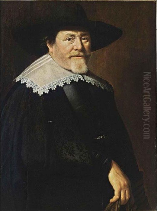 A Portrait Of A Bearded 
Gentleman, Half Length, Wearing A Black Suit, A Black Hat And A White 
Lace Collar, Holding Gloves In His Right Hand Oil Painting by Claes Cornelisz Moeyaert