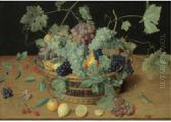 A Still Life With Fruit In A 
Basket, Including Bunches Of Grapes And Lemons, Cherries And Oranges On 
The Wooden Table Beneath Oil Painting by Isaak Soreau