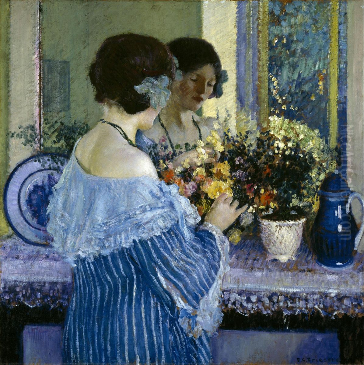 Girl in Blue Arranging Flowers Oil Painting by Frederick Carl Frieseke