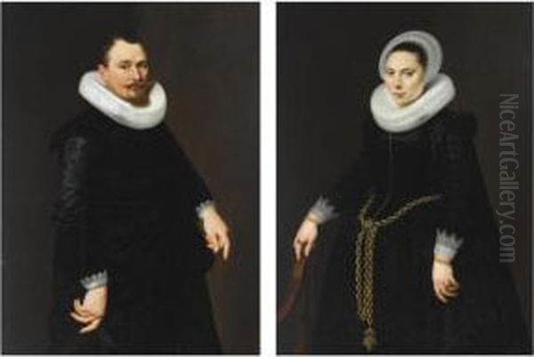 A Portrait Of Pieter Merchijs 
(1582-before 1628), Aged 39, Standing Three-quarter Length, Wearing An 
Elaborate Black Suit With White Lace Cuffs And A Mill-stone Collar, 
Holding A Hat; A Portrait Of His Wife, Maria Florianus (born 1600), Aged
 22, S Oil Painting by Cornelis van der Voort