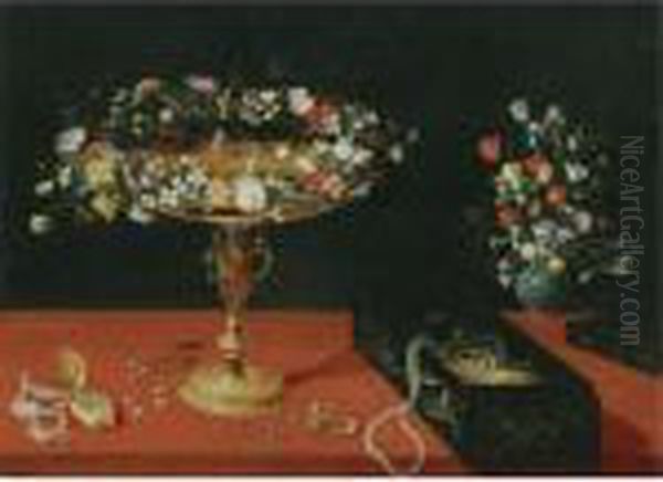 Still Life With A Garland Of 
Flowers On A Gold Tazza, A Box Of Jewellery, A Gold Pocket Watch And A 
Vase Of Flowers, All Arranged On A Table Draped In Red Oil Painting by Jan Brueghel the Younger