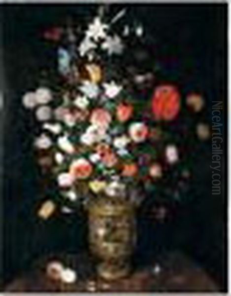 Still Life Of Roses, Daffodils, 
Carnations, Snake-head Fritillaries, Irises And Lilies In A Sculpted 
Parcel-gilt Vase, Upon A Stone Ledge Oil Painting by Jan Brueghel the Younger