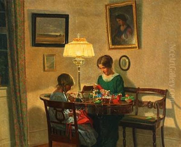 Mother And Daughter Making Christmas Decorations Oil Painting by Karl Harald Alfred Broge