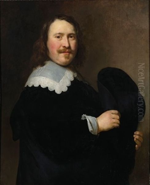 A Portrait Of A Gentleman, Standing Half-length, Turned To The Right, Wearing A Black Coat With A White Lace Collar, Holding His Hat With Both Hands Oil Painting by Govaert Flinck Cleve