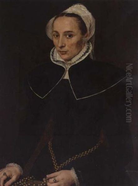 Portrait Of A Lady Wearing A Black Dress With A White Collar And Headdress, Holding A Gold Chain Oil Painting by Willem Adriaensz Key