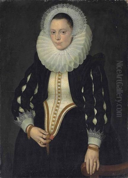 Portrait Of A Woman, Three-quarter-length, In A Black Dress With A Stomacher, Slashed Sleeves, Lace Cuffs, A Ruff And A Lace Headdress, Holding A Rose Oil Painting by Michiel Jansz. van Mierevelt