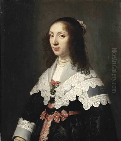 Portrait Of Agatha De Vlaming Van Oudtshoorn (1619-1675), Half-length, In An Embroidered Black Dress With Red And Silver Silk Decorations, With A White Lace Collar And Cuffs, A Pearl Necklace And A Jewelled Tiara Oil Painting by Michiel Jansz. van Mierevelt