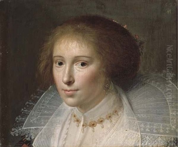 Portrait Of A Lady In A White Dress With Lace Collar And A Gold And Pearl Necklace Oil Painting by Paulus Moreelse