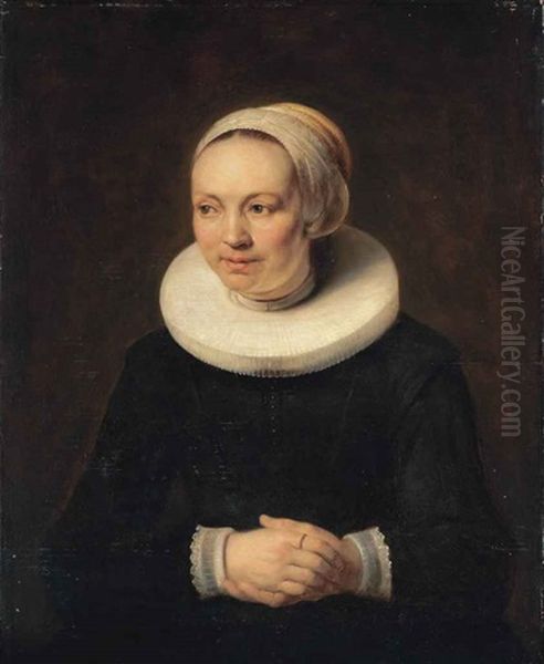 Portrait Of A Lady, Half-length, In A Black Dress, With White Ruff, Lace Cuffs And White Headdress Oil Painting by Harmenszoon van Rijn Rembrandt