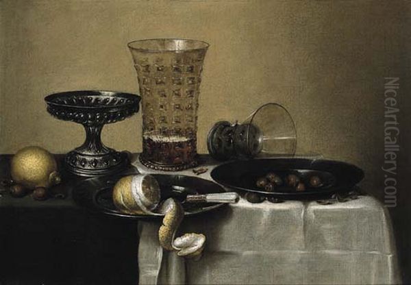 Still life with a silver tazza, a beer glass and an upturned berkemeyer Oil Painting by Willem Claesz. Heda