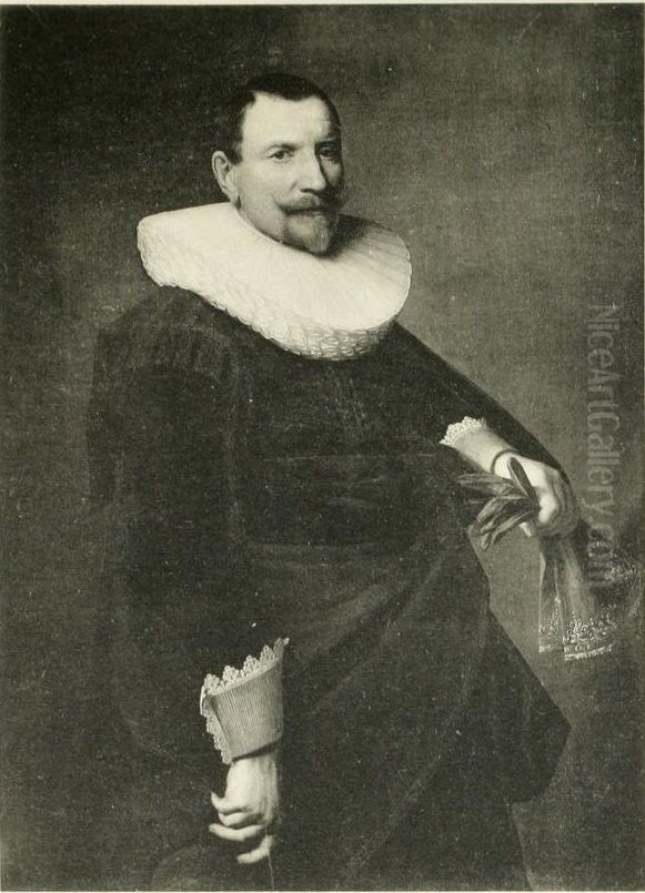 Portrait of a man holding a hat and gloves Oil Painting by Nicolaes Eliaszoon Pickenoy